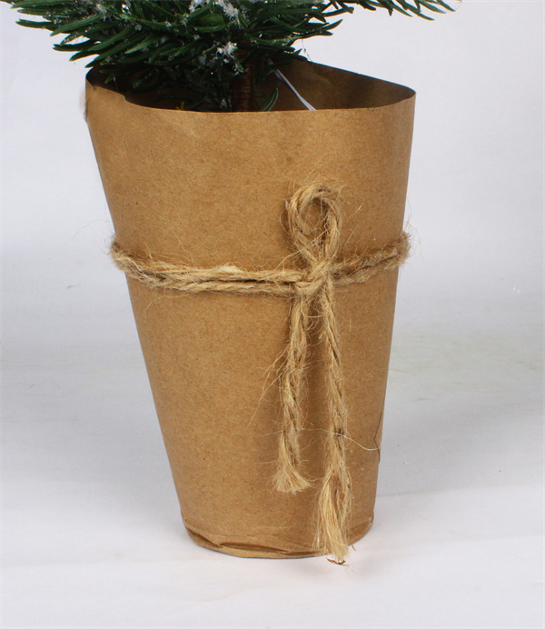 Small Christmas Decorations in Brown Paper Pot